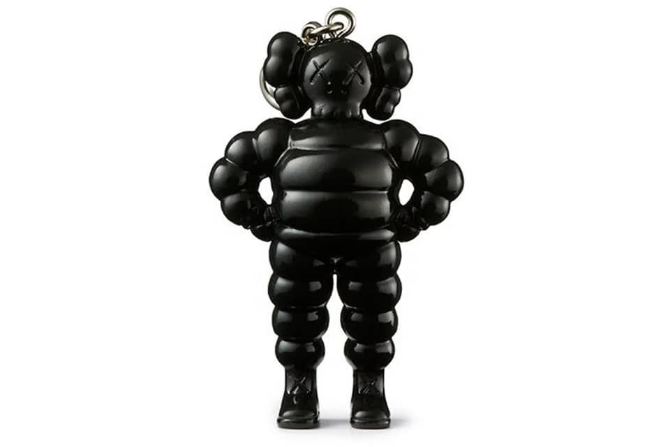 dd3bdb_83fa7b0451b24b4daad3a85e1b63cbdf~mv2 KAWS Tokyo First Chum Keychain Clear/White/Black/Yellow/Pink - Image 1